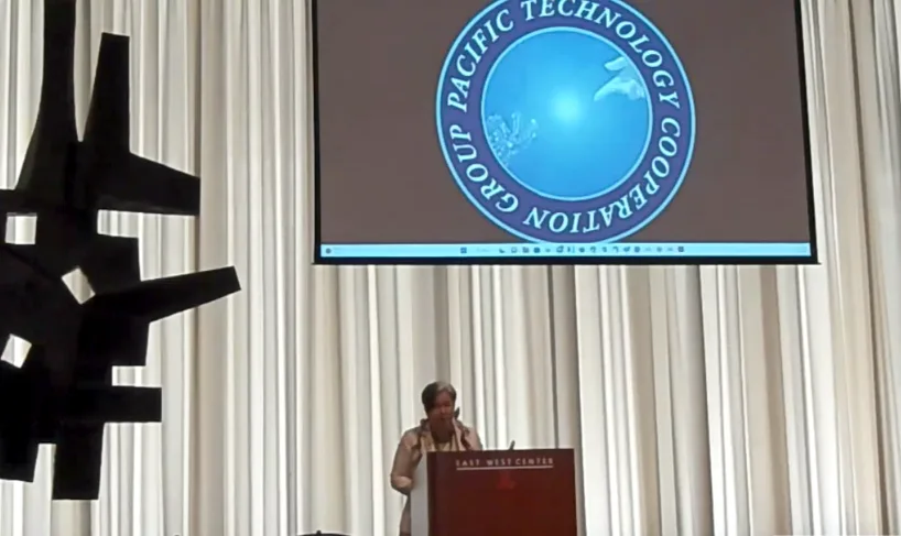A keynote speaker addressing the summit at the East-West Center